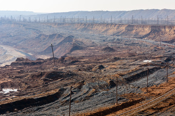 View on iron ore quarry in a dust haze