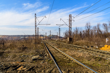 View on slag heaps of the iron ore quarry and railroad