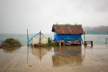 small fishing hut in port