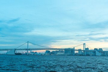 Rainbow bridge eveing in Tokyo city.