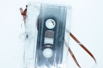 The old audio cassette is located on a white background