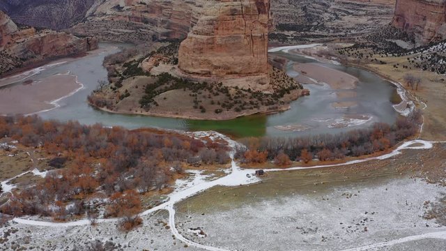 Tilt up to reveal Steamboat Rock and the Green River a wide landscape view of Echo Park in Dinosaur National Monument, Colorado.