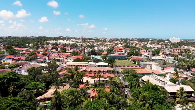 Srone fliyng backwords from Itapu&atilde; district inSalvador Bahia Brazil towards the sea.