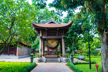 A large drum in a pavilion in the fifth courtyard of The Temple of Literature, Hanoi, Vietnam; at a bright summer day.