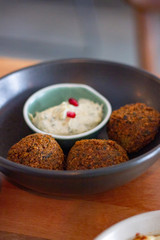 Fried falafel with yogurt sauce