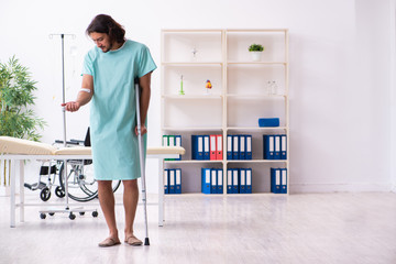 Young male patient in blood transfusion concept