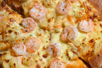 italian pizza cheese with pineapple and shrimp topping sea food