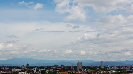 Obraz premium white cloud on blue sky above the town, aerial view cityscape