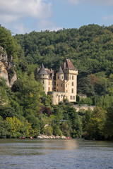 Fototapeta na wymiar La Roque-Gageac, Dordogne, France - September 7, 2018: Chateau La Malartrie in La Roque-Gageac, Dordogne river valley. Aquitaine, France