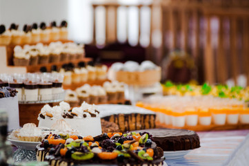 Candy bar. Table with sweets, candies, dessert