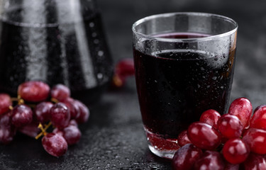 Red Grape Juice (selective focus; detailed close-up shot)