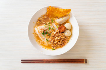 spicy noodles with fish ball and minced pork (Tom Yum Noodles)