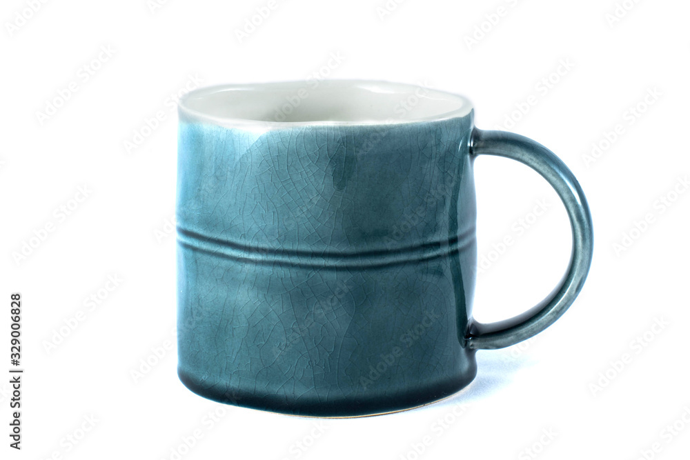 Wall mural blue ceramic mug isolated on white background