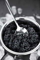Black Caviar as detailed close-up shot, selective focus