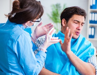 Patient afraid of dentist during doctor visit