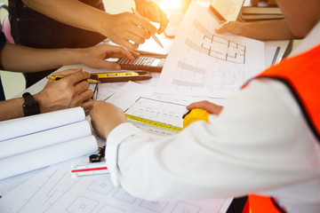 Engineers are meeting to discuss the design of a residential project.concept