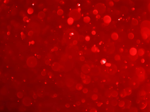 red bokeh background with soft blur bokeh light.