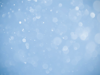 Abstract blue bokeh background.Blurred bright light.