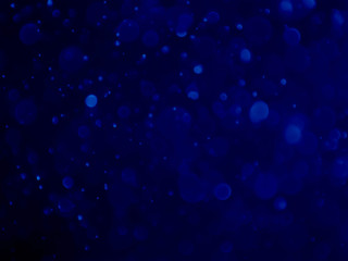 Abstract blue bokeh background.Blurred bright light.