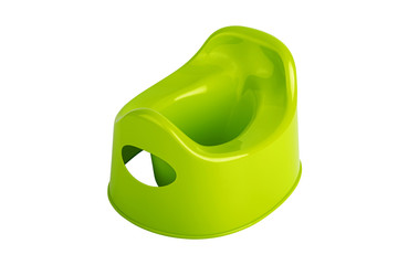 Green childish plastic toilet pot isolated on a white background. Green childish plastic pot for...