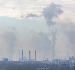 Fototapeta na wymiar Toxic smoke from pipes at the factory