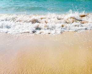 sand and water on the seashore as a background