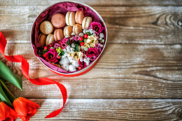 Spring flowers. Tulips flowers on rustic wooden background. Copy space.