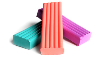 multi-colored plasticine on a white background. Educational games for children