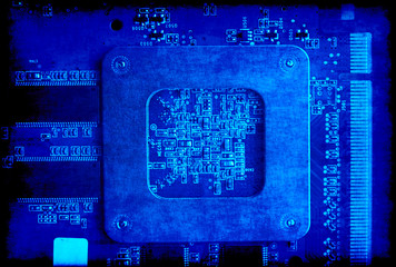 Electronic circuit board blue grunge background