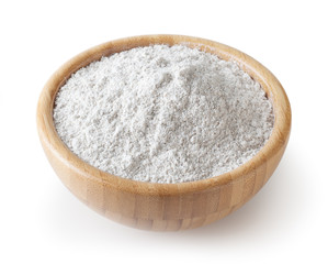 Rye flour in wooden bowl isolated on white background with clipping path