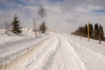 snowy mountain road after heavy snowfall