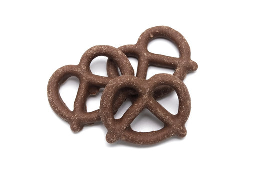 Pretzel with Chocolated biscuit flavored and coated chocolated cream on white background.