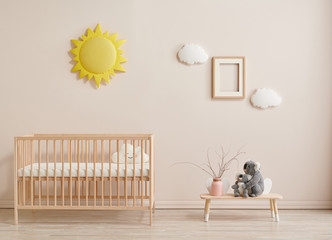 Wooden baby room furniture bed and crib, sun and cloud toys and frame style.