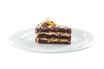 Piece of chocolate cake with walnut and cherry isolated on white background