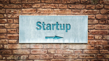 Fototapeta na wymiar Street Sign to Startup