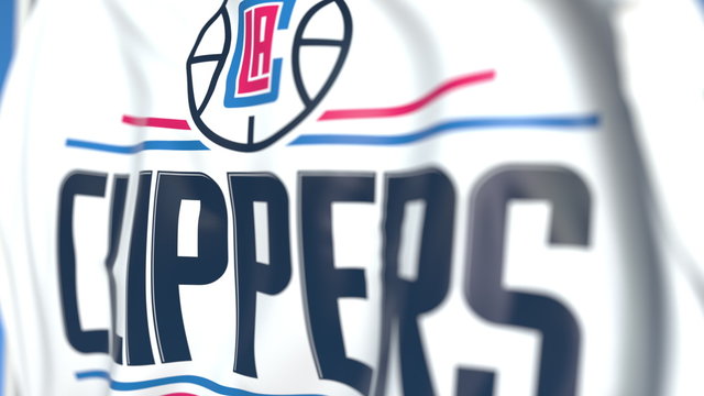Waving flag with Los Angeles Clippers team logo, close-up. Editorial 3D rendering