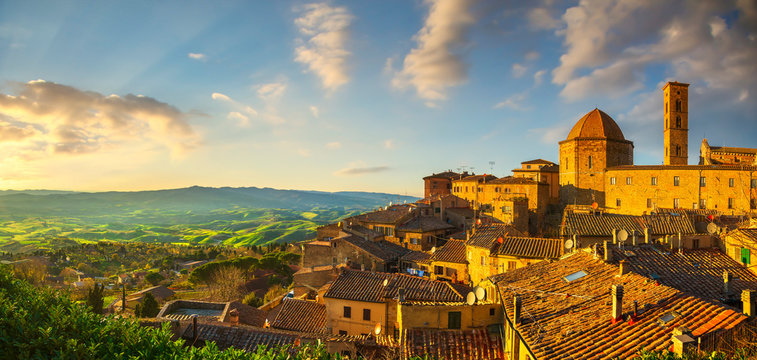 Tuscany, Volterra town skyline, church and panoramic view at sunset. Italy