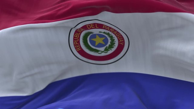 4k Paraguay National flag slow loop seamless waving with visible wrinkles in wind blue sky background.A fully digital rendering;animation loops at 20 seconds.