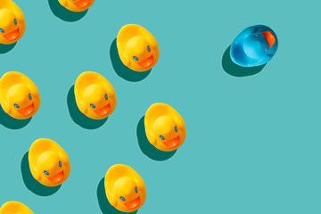 yellow rubber ducks on turquoise blue background