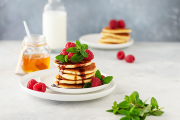 Sweet pancakes with raspberry
