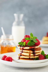 Sweet pancakes with raspberry