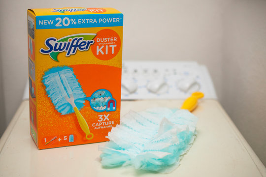 Box of Procter and Gamble's swiffer duster kit on a laundry machine