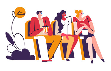 People in 3D glasses watching movie and eating popcorn at cinema