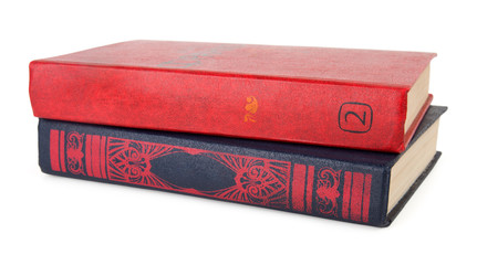 two books on white background