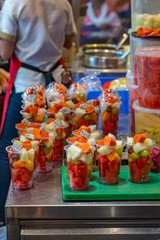 Mixed fruit cups for sale at sweet dessert store