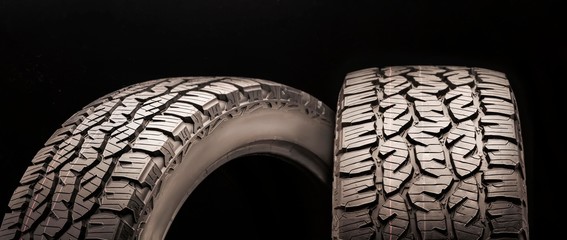 matador izzarda at 2-all-season off-road tires all terrain, sidewall close -up on a dark background © Vladimir Razgulyaev