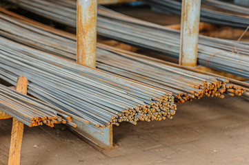 Metal profile square in packs at the warehouse of metal products