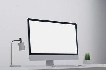 Modern designer desk with empty screen