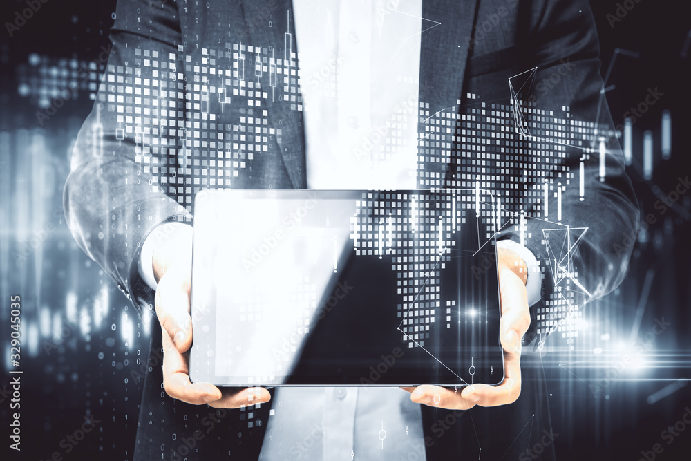 Poster businessman holding tablet with glowing global stock statistics.
