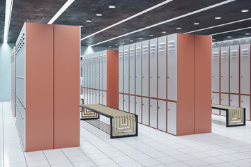 Side view of modern locker room interior with bench.